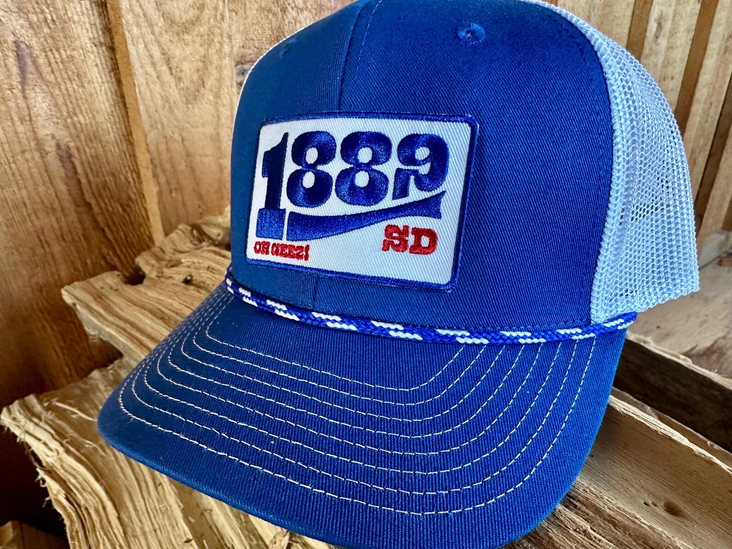 1889 South Dakota Rope Trucker Hat Blue and White